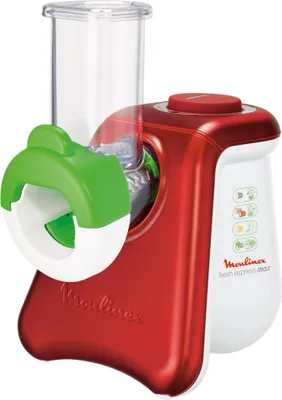 A red and white electric vegetable slicer and grater.