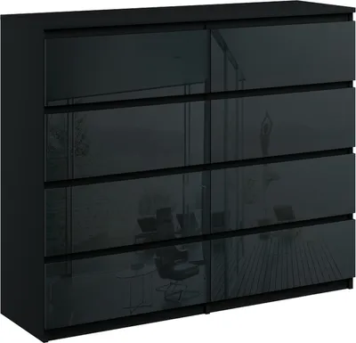 A black dresser with high-gloss drawers.