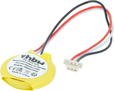 A yellow circular battery with wires and a connector is shown against a white background.