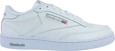 A white Reebok Club C 85 sneaker is shown from the side against a white background.