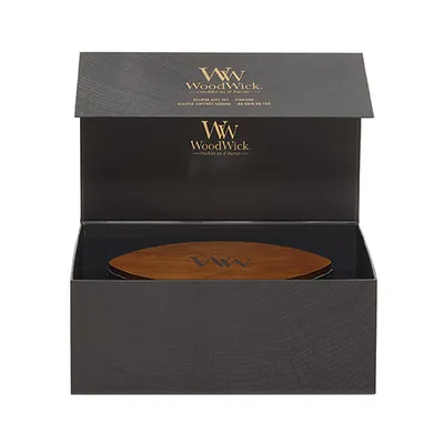 An open gift box with a wooden lid inside.