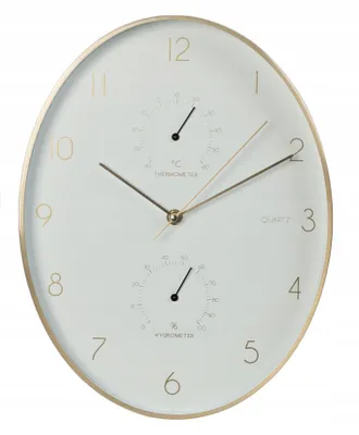 A white wall clock with gold accents and two integrated gauges.