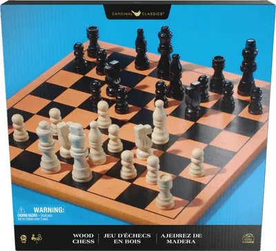 A box containing a wooden chess set with pieces arranged on the board.