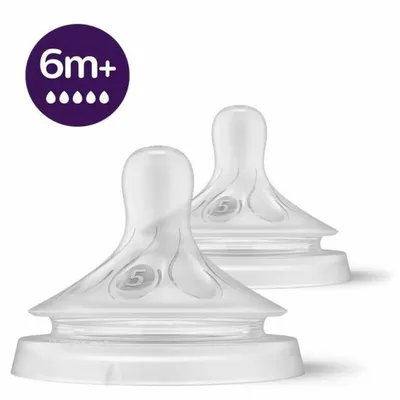 Two clear baby bottle nipples with a purple circle containing text and droplet icons in the upper left corner.