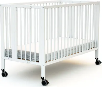 A white foldable baby crib with a mattress inside, shown on a white background.