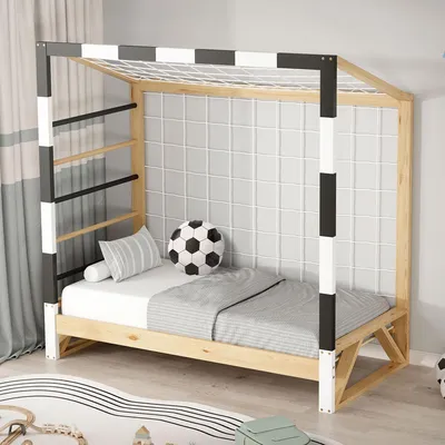 A child's bed designed to look like a soccer goal, complete with a net and ladder.