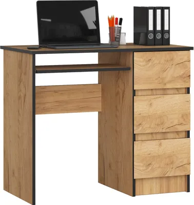 A product shot of a desk with a laptop, pens, and binders.