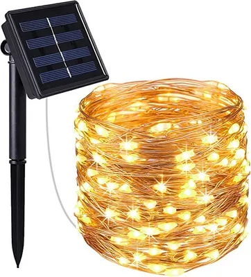 A solar-powered string of lights with a solar panel and stake.