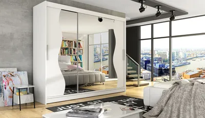 A spacious white wardrobe with mirrored doors is shown in a modern bedroom with a large window overlooking a city skyline.