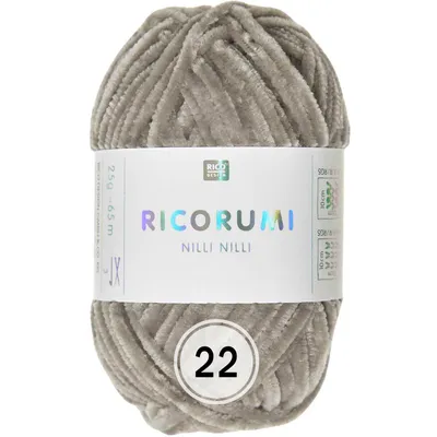 A ball of beige yarn with a label.