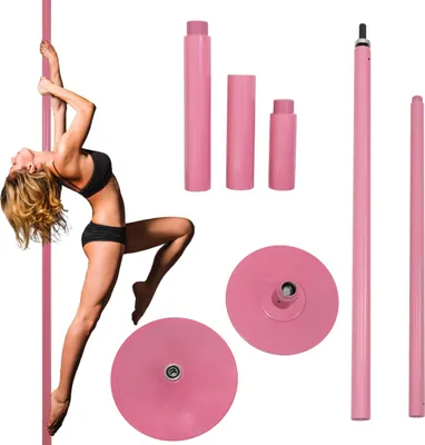 A woman is posing with a pink pole dancing pole, with various components of the pole displayed around her.