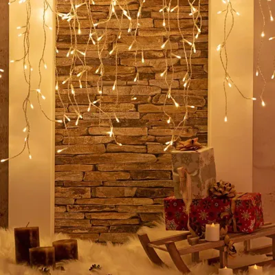 Produktbild von Idena LED Lichter-Kette Eiszapfen mit 400 LED in Warmweiß, mit 8 Stunden Timer Funktion und Transformator, ca. 10,27 m lang, Dekoration von Garten, Balkon, Terrasse und zu Weihnachten