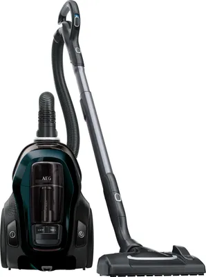 A black and teal AEG vacuum cleaner with its hose and floor head, presented against a white background.