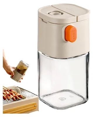 Produktbild von Salzflasche mit präziser Messung und Doppeldüsen für Küchengewürze und Reisen
