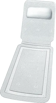 A white bath mat with a textured surface and a small headrest.