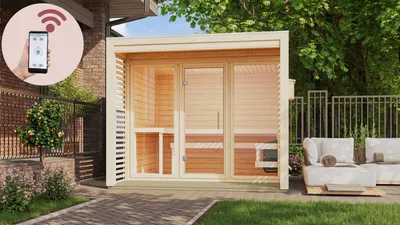 An outdoor sauna in a backyard setting with lounge chairs nearby.