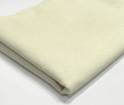 Immagine prodotto di Tessuto di cotone tinta unita, 150 cm di larghezza extra, venduto al metro - color crema chiaro