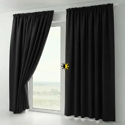 Black curtains hanging on a window rod, with one curtain partially drawn back.