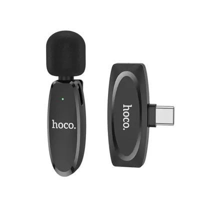 Two black wireless microphones with USB-C connectors, displayed against a white background.