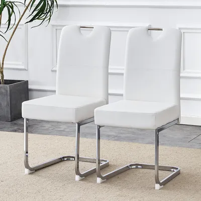 Produktbild von Weiße Esszimmerstühle 2er Set gepolsterte Küchenstühle mit integrierter Federung ergonomisches Design stabiler Metallrahmen Kunstleder Polsterstühle