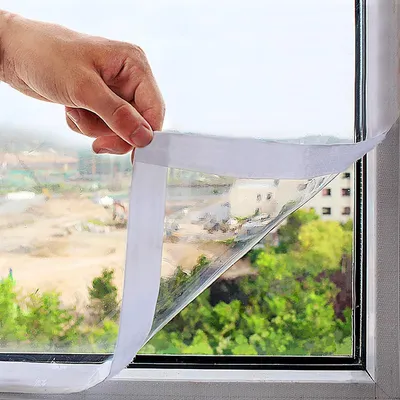 Produktbild von Fensterisolierfolie 120 x 160 cm - Kälteschutz für Winter - Transparente, zuschneidbare Isolierfolie mit Klettverschluss - Wiederverwendbar