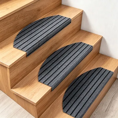 Immagine prodotto di 15 tappetini antiscivolo per scale, autoadesivi e a forma semicircolare