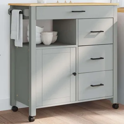 A kitchen cart with drawers and a cabinet.