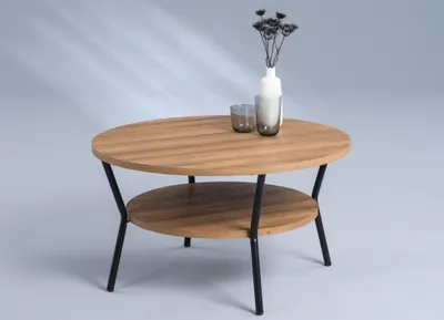 A round, two-tiered coffee table with a wood-grain finish and black metal legs, set against a light gray background with subtle light reflections.