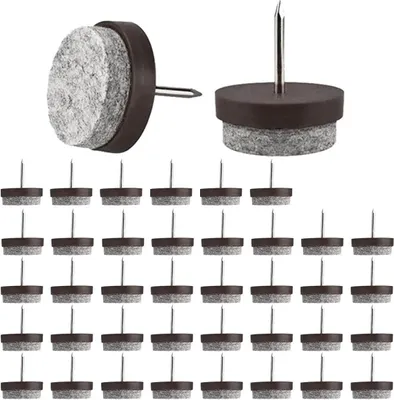 A collection of nail-in felt furniture glides with brown plastic bases and gray felt pads.