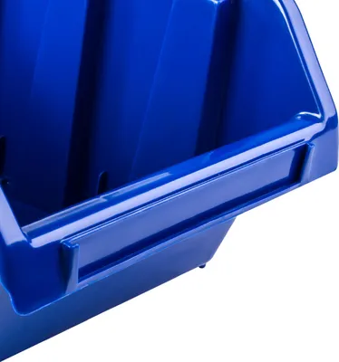 A close-up view of a blue plastic storage bin.