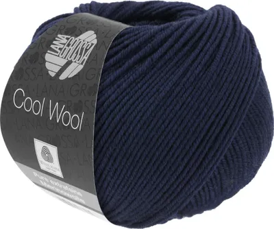 A ball of dark blue yarn with a label.