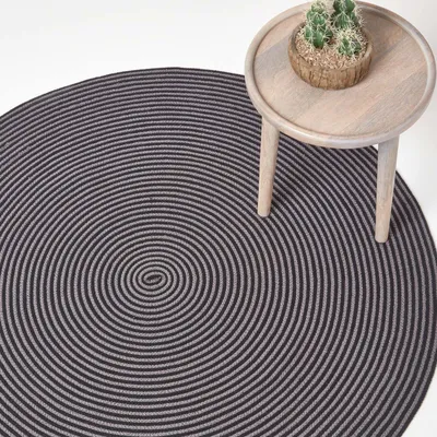 Obrázek produktu pro HOMESCAPES Ručně tkaný koberec se spirálovým vzorem v šedé a černé barvě, kulatý, 120 cm