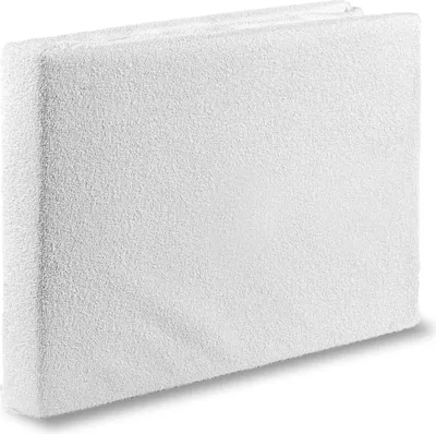 A white terry cloth mattress protector is shown from a slight angle against a white background.