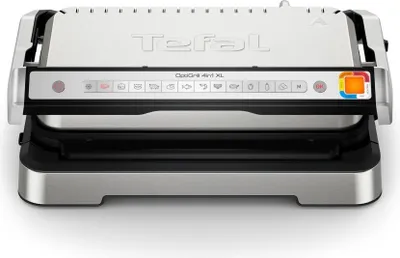 A front-on studio shot of a silver and black electric grill.