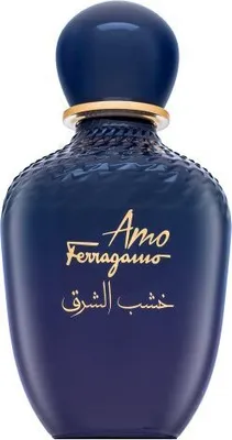 A dark blue perfume bottle with gold lettering.