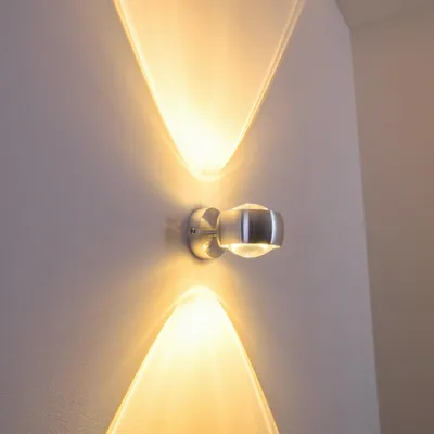 Produktbild von Osacca »Osacca« halbrund aus Metall mit Effekt-Licht an der Wand in Silber