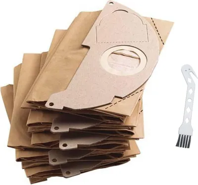 A stack of brown paper vacuum cleaner bags with a small white cleaning tool.