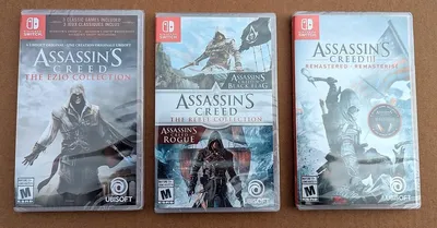 Three Nintendo Switch game cases are lined up on a surface.