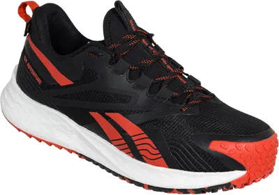 A single black and orange Reebok safety shoe is shown against a white background.
