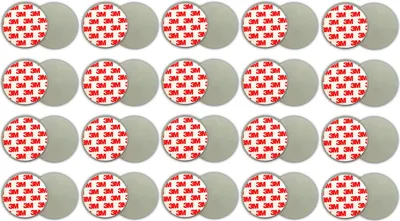 A grid of circular adhesive pads, each with a gray side and a red side featuring the 3M logo.