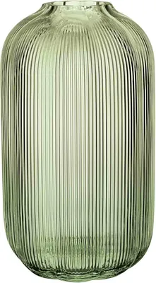 A close-up studio shot of a green glass vase.
