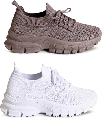 Two pairs of sneakers, one brown and one white, displayed side-by-side against a white background.