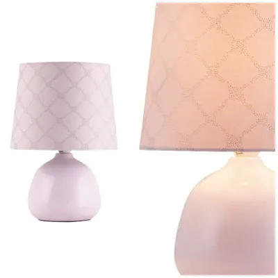 Two views of a pink ceramic table lamp with a patterned lampshade, presented on a white background.