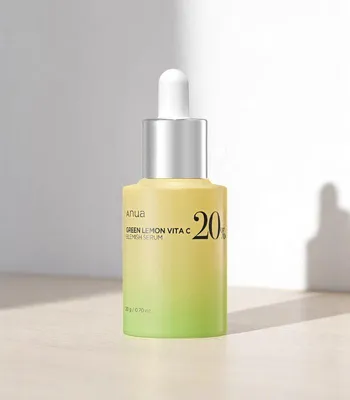 A product shot of a serum bottle with a gradient background.