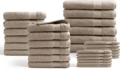 Stacks of folded towels on a white background.