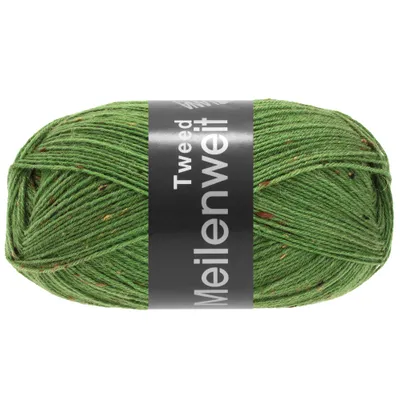 A ball of green yarn with flecks of other colors, wrapped with a black label.