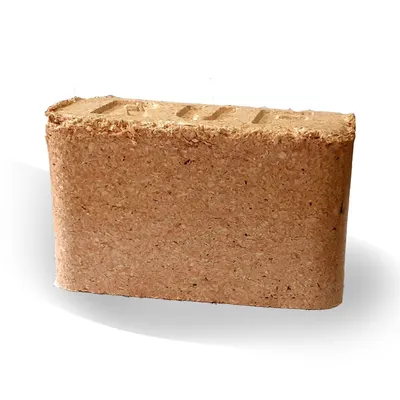 A single compressed wood briquette for burning.