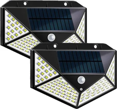 Two black solar-powered outdoor lights with motion sensors and white LEDs are shown against a white background.