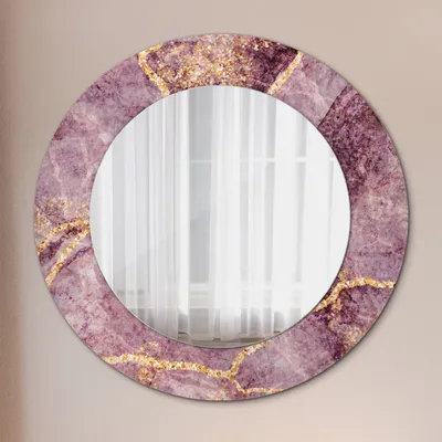 A round mirror with a purple and gold marble-like frame is displayed against a light gray background.