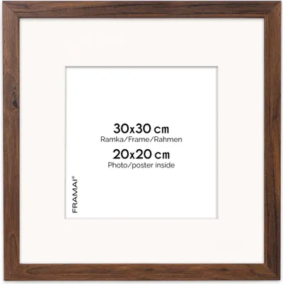 A square picture frame with a white mat and text indicating dimensions.